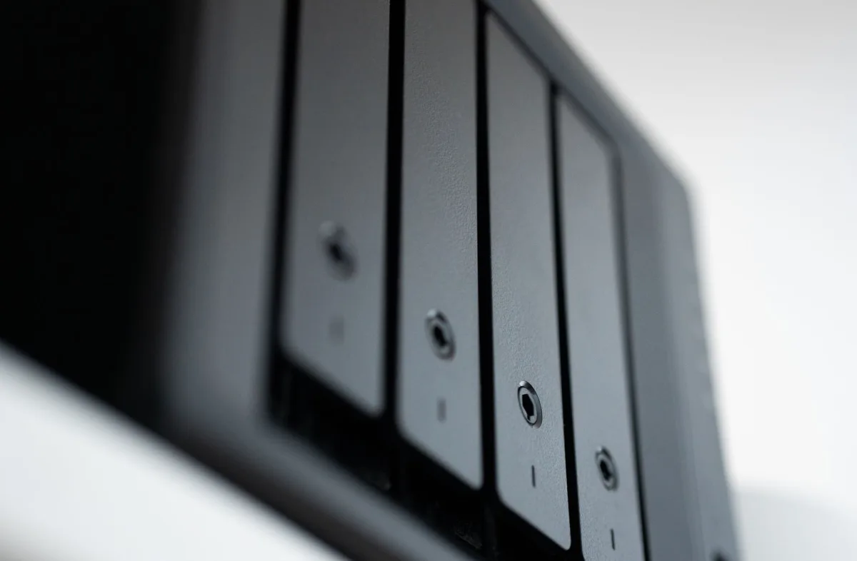 Detailed view of a black data storage unit highlighting modern technology and data management. Detailed view of a black data storage unit highlighting modern technology and data management.