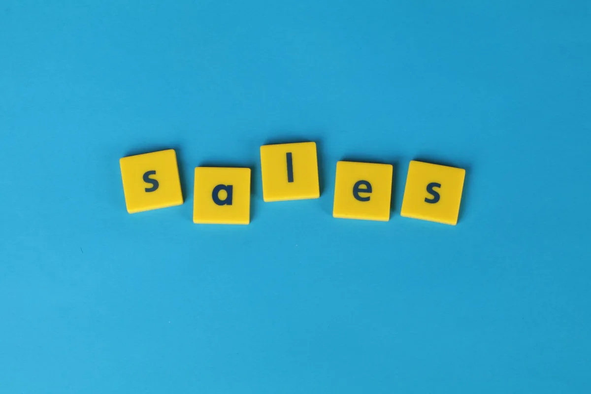 Yellow Scrabble tiles spelling 'sales' on a vibrant blue background. Perfect for marketing business themes. Yellow Scrabble tiles spelling 'sales' on a vibrant blue background. Perfect for marketing business themes.