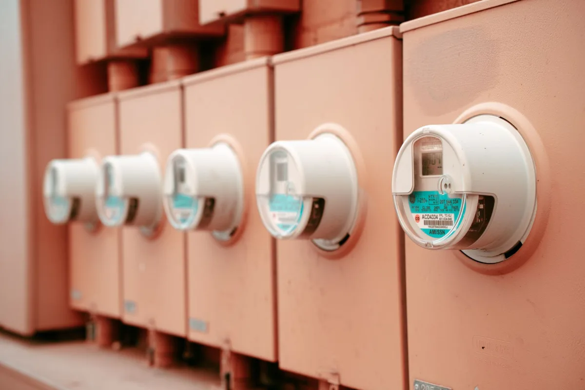 Close-up view a row industrial electricity meters for power monitoring and technology.