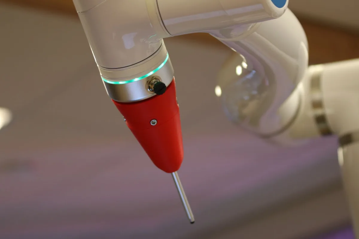 Detailed view of a cutting-edge industrial robotic arm in action. Detailed view of a cutting-edge industrial robotic arm in action.