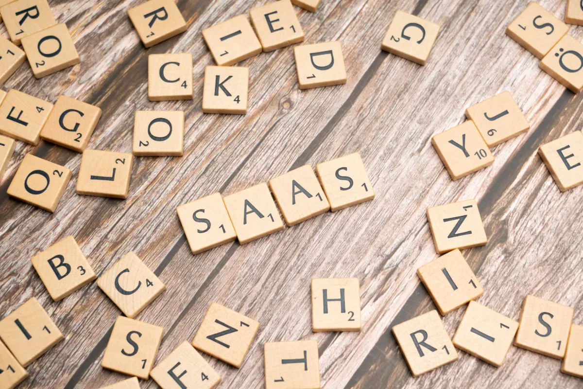 Wooden letter tiles spelling SaaS on rustic wood. Ideal for cloud computing and business concepts. Wooden letter tiles spelling SaaS on rustic wood. Ideal for cloud computing and business concepts.