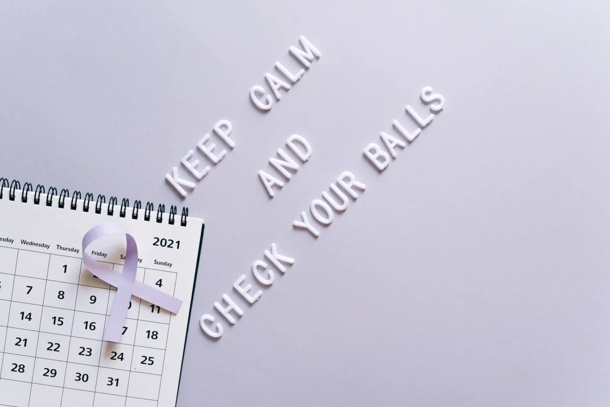 Cancer awareness concept with calendar and text reminder for self-check in minimalist style.