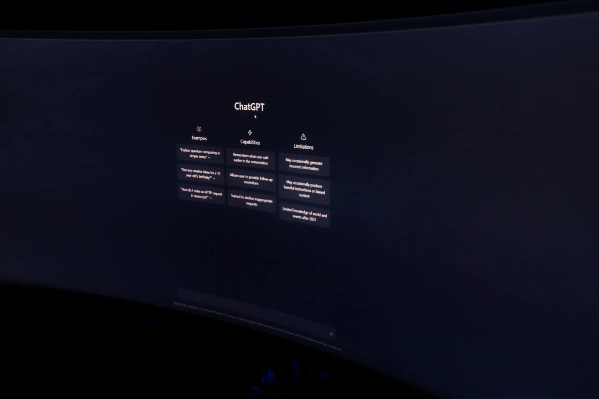 A dark, minimalist photo of a computer monitor displaying the ChatGPT interface. A dark, minimalist photo of a computer monitor displaying the ChatGPT interface.