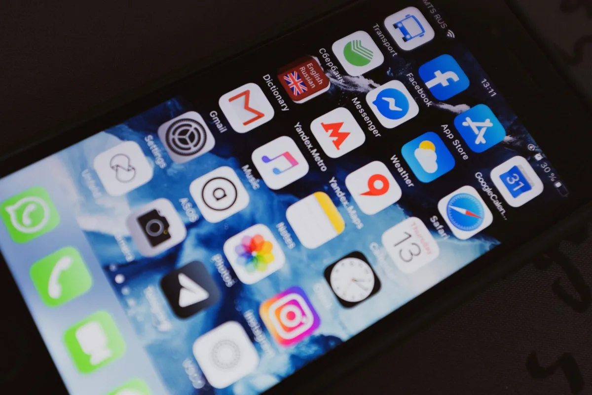 Close-up of a smartphone displaying popular social media and productivity apps on its screen. Close-up of a smartphone displaying popular social media and productivity apps on its screen.