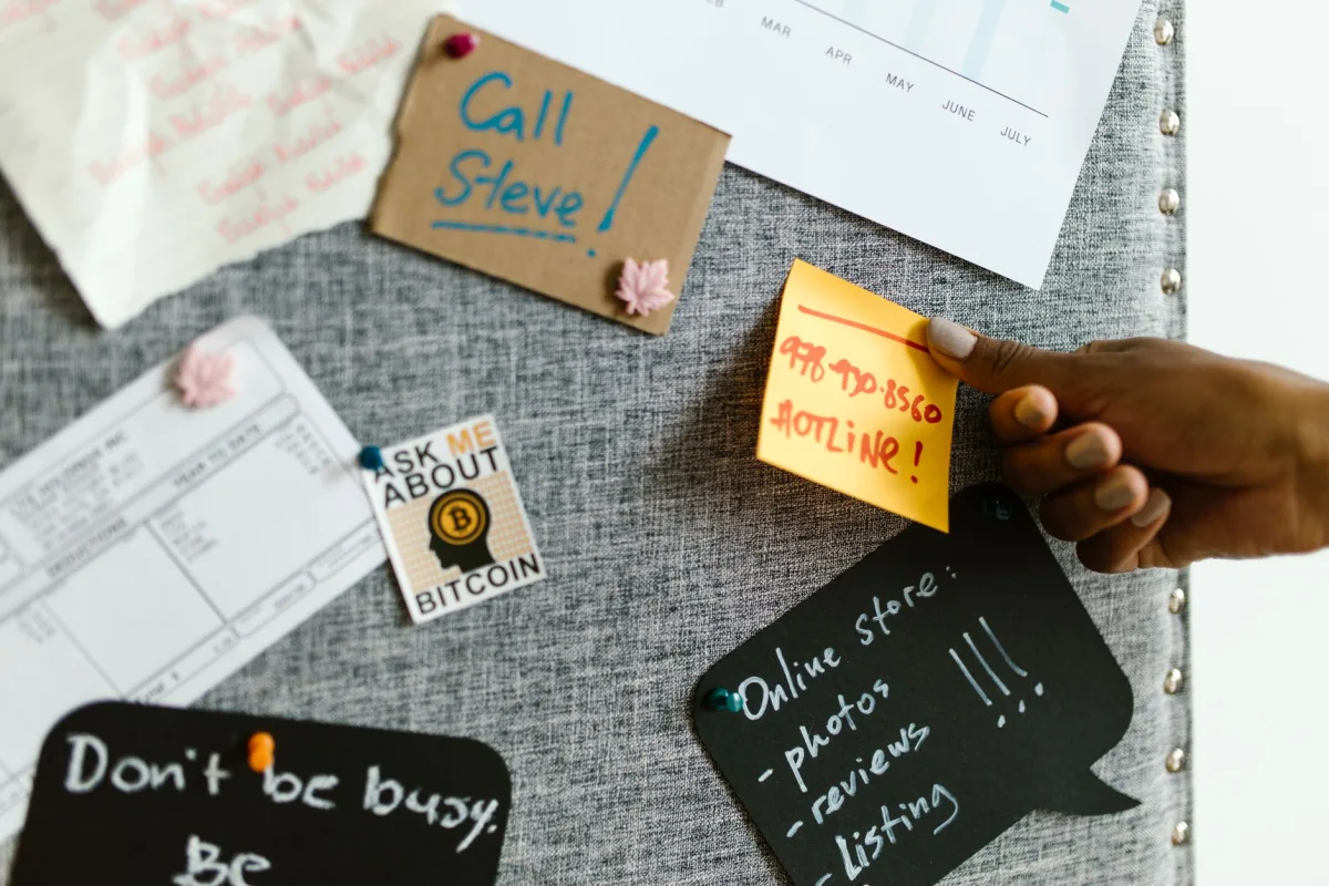 A bulletin board filled with notes, reminders, and motivational quotes, showcasing creativity and organization. A bulletin board filled with notes, reminders, and motivational quotes, showcasing creativity and organization.