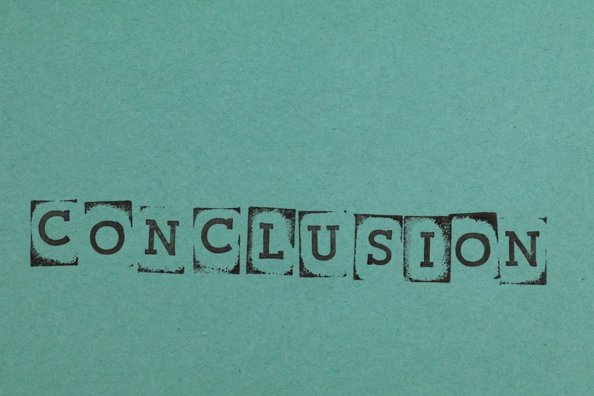 Conclusion word stamped on textured blue paper with block letters, conveying finality. Conclusion word stamped on textured blue paper with block letters, conveying finality.