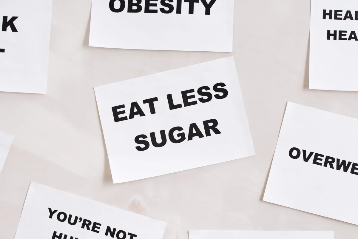 Minimalist photograph of motivational cards with healthy lifestyle messages on a white background. Minimalist photograph of motivational cards with healthy lifestyle messages on a white background.