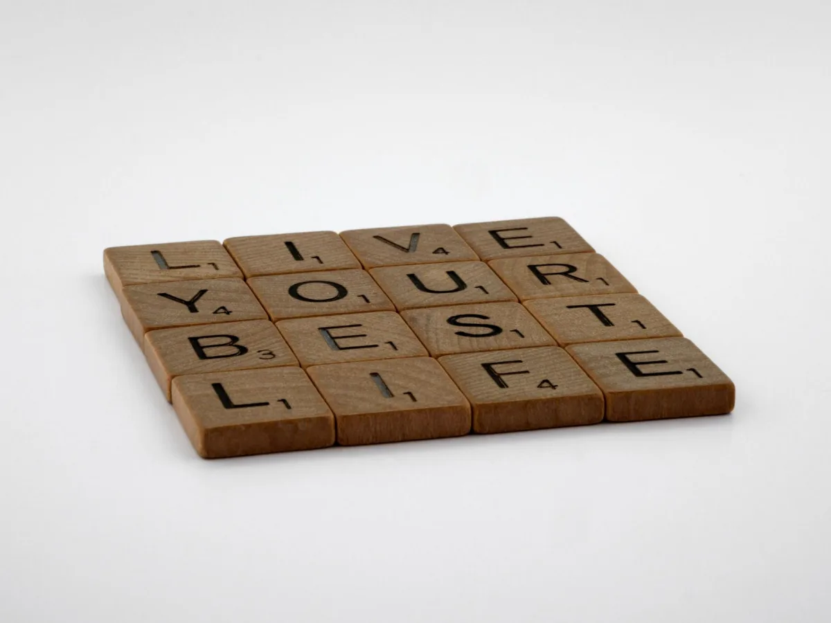 Scrabble tiles spelling 'Live Your Life' on a white background. Scrabble tiles spelling 'Live Your Life' on a white background.