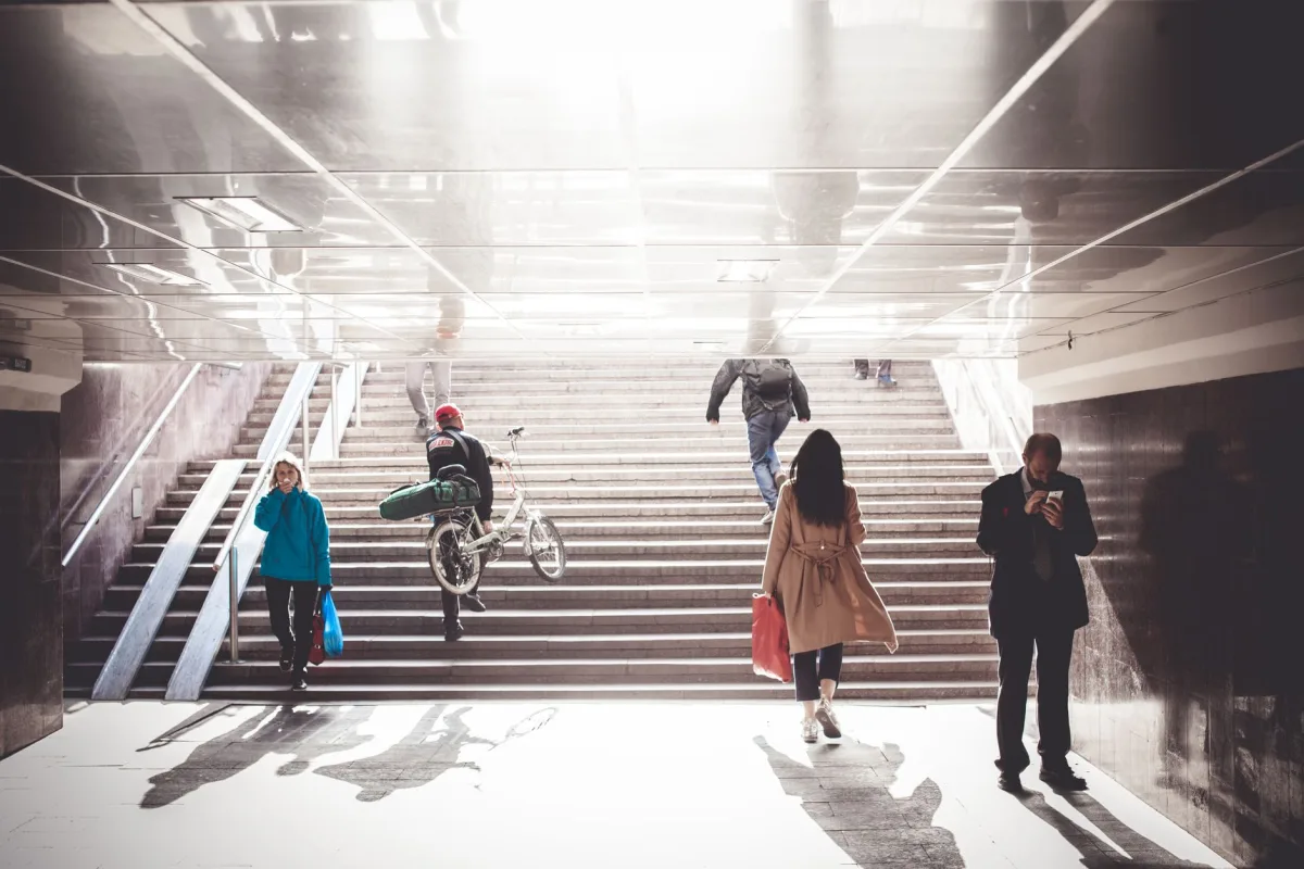 People walking through an underground passage in Moscow, showcasing urban daily life. People walking through an underground passage in Moscow, showcasing urban daily life.