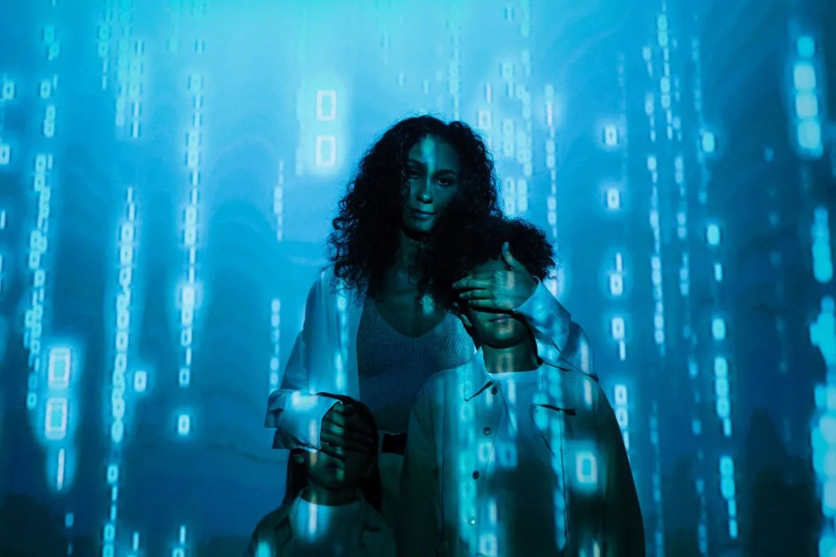 A family stands in digital blue light, symbolizing online privacy and security. A family stands in digital blue light, symbolizing online privacy and security.