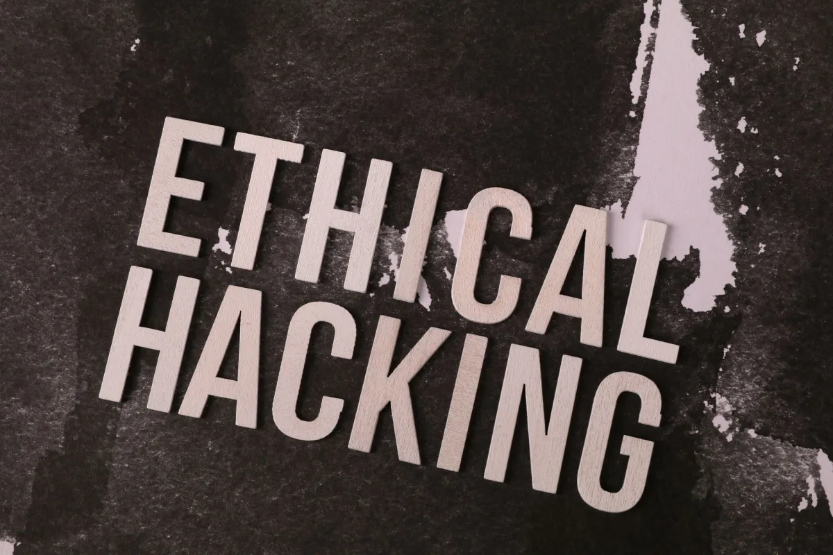 Conceptual image showing the words 'Ethical Hacking' on a textured abstract background.